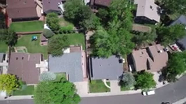 WESTMINSTER COLORADO-2017: Rooftops Neighborhood Sun Solar Panels Yard Summer