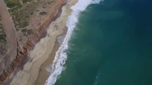 PLAYITA BCS MEXICO-2017: Aerial View Of Shoreline With Waves Crashing Stretch Of