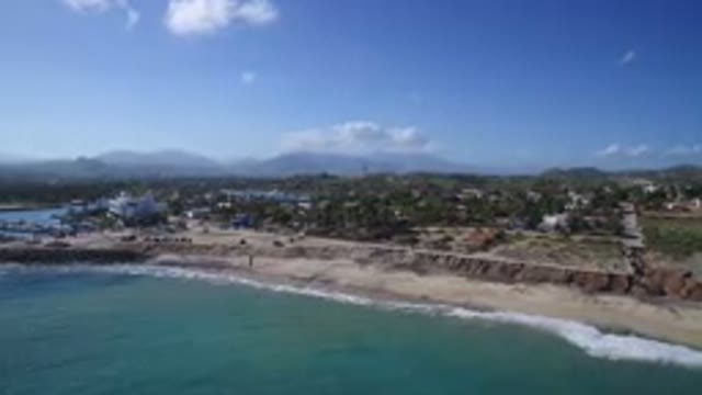 PLAYITA BCS MEXICO-2017: The Blue Waves Hitting The Sandy Beach Looks