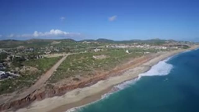 PLAYITA BCS MEXICO-2017: Rising Shot Sea With Beach Near Shrub-Land Roads And Houses