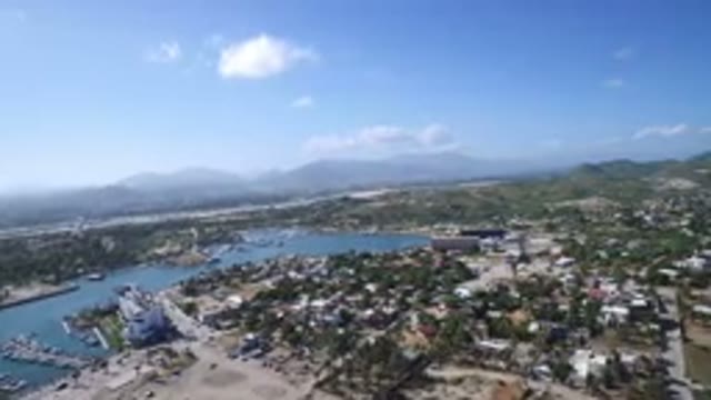 PLAYITA BCS MEXICO-2017: Slow Moving Shot From Above Buildings And Trees And