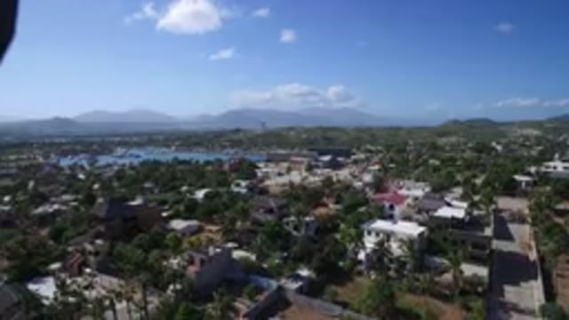 PLAYITA BCS MEXICO-2017: A Drone Shot Of A Small City With A Mountainous Landscape