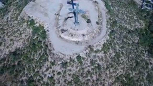 PLAYITA BCS MEXICO-2017: Aerial View Of Large Cross Statue On Hill Of Sand