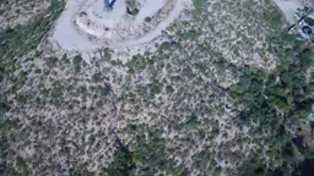 PLAYITA BCS MEXICO-2017: Top View Of A Cross On A Rocky And Grassy Mountain