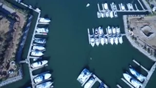 PLAYITA BCS MEXICO-2017: Multiple Boats Parked Around Water By The Docks Nearby