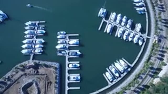 PLAYITA BCS MEXICO-2017: Aerial View Of Marina Showing A Small Boat Passing