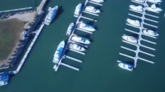 PLAYITA BCS MEXICO-2017: An Aerial View Of A Parking Lot And Boats Near Water