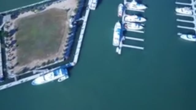 PLAYITA BCS MEXICO-2017: The View Of A Lake Or River Surrounded By Boats And Jet Skis
