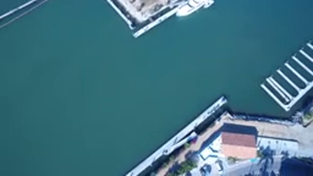 PLAYITA BCS MEXICO-2017: Panning Aerial View Of Water Body And Surrounding Scenery