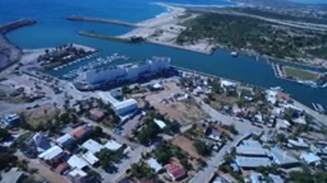 SAN JOSE DEL CABO MEXICO-2017: An Aerial View Of A Seaport With A Seawall Docks