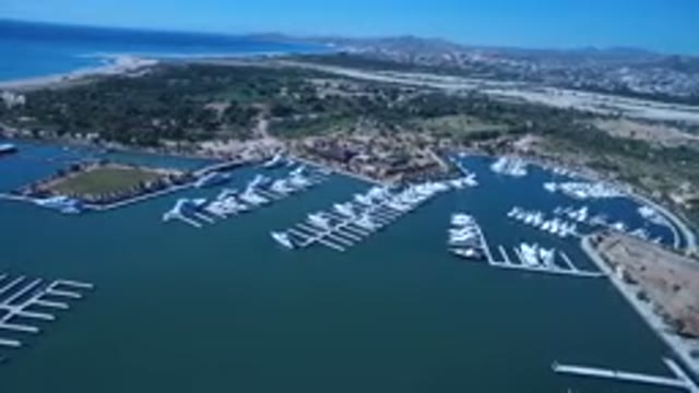 SAN JOSE DEL CABO MEXICO-2017: Blurry 8mm Footage Of Boats In A Harbor On A Sunny Day