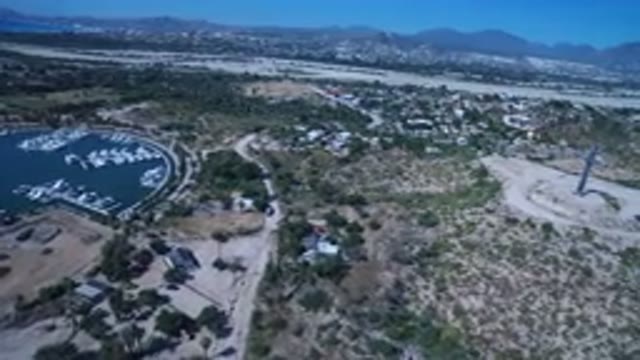 SAN JOSE DEL CABO MEXICO-2017: Lakeside Boats and Speedboats Near Houses and Landmarks