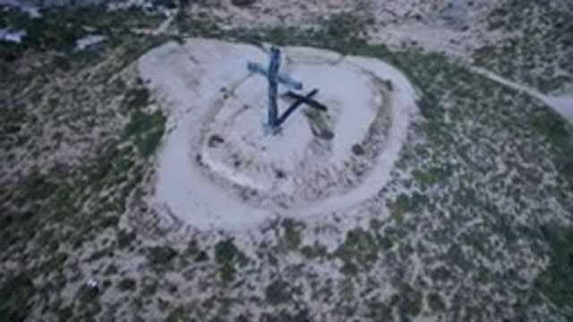 SAN JOSE DEL CABO MEXICO-2017: Cross On Top Of A Hill Covered With White Snow