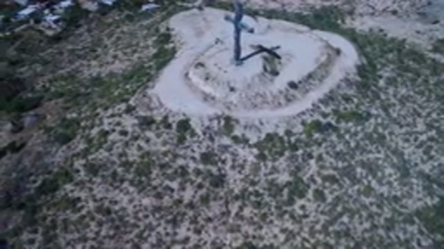 SAN JOSE DEL CABO MEXICO-2017: Aerial View Of A Crucifixion On A Rocky Grassy Hill