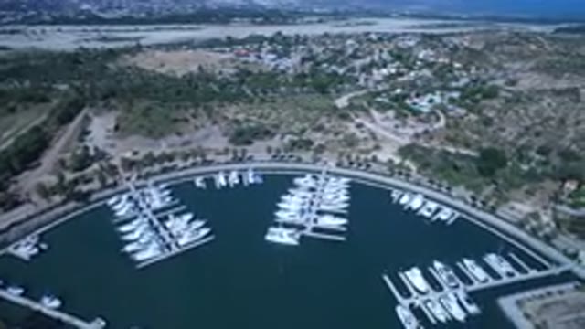 SAN JOSE DEL CABO MEXICO-2017: Aerial View Of Boats In Marina Surrounded By Land