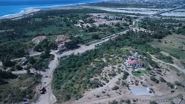 SAN JOSE DEL CABO MEXICO-2017: Wide Sea Hitting The Beach Surrounded By Trees