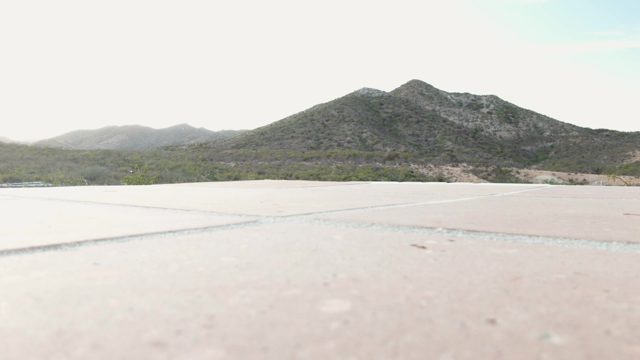 CABO PULMO BCS MEXICO-2023: Distant Mountain Range Beyond Concrete Surface