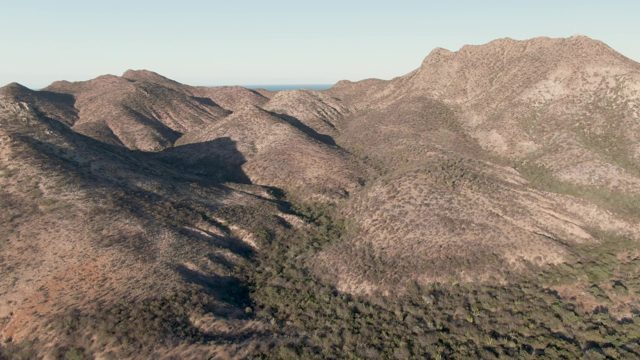 CABO PULMO BCS MEXICO-2023: Aerial Pan of Rugged Mountain Range
