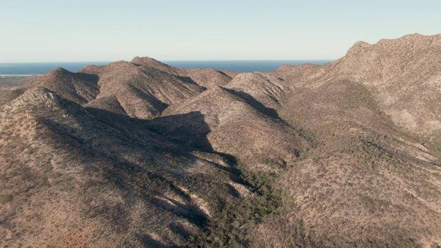 CABO PULMO BCS MEXICO-2023: Arid Mountain Ridges and Distant Ocean