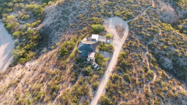 CABO PULMO BCS MEXICO-2023: Van Departing From a Hilltop House