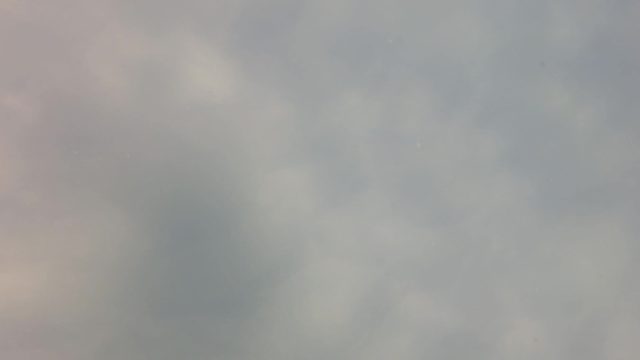 SAN JOSE DEL CABO BCS MEXICO-2023: Clouds Drifting Across Hazy Sky