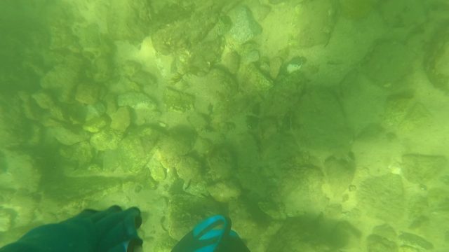 SAN JOSE DEL CABO BCS MEXICO-2023: Snorkeler's Underwater View Transitioning to Beach Shore