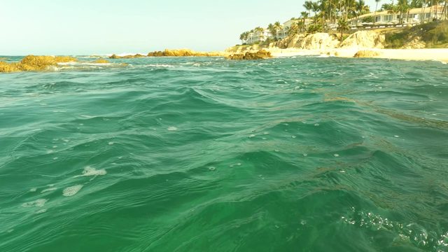 SAN JOSE DEL CABO BCS MEXICO-2023: Water-level View of Ocean Waves Approaching Shore