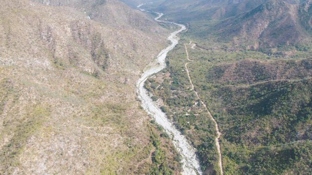 SAN DIONISIO BCS-2023: Winding River and Road Through Mountain Valley