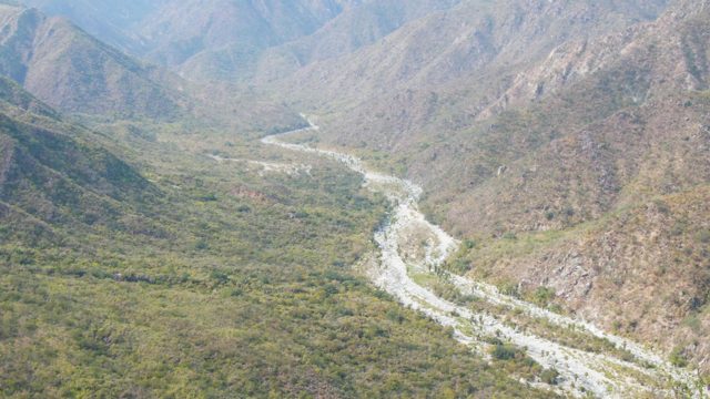 SAN DIONISIO BCS-2023: Winding River Through Mountain Valley