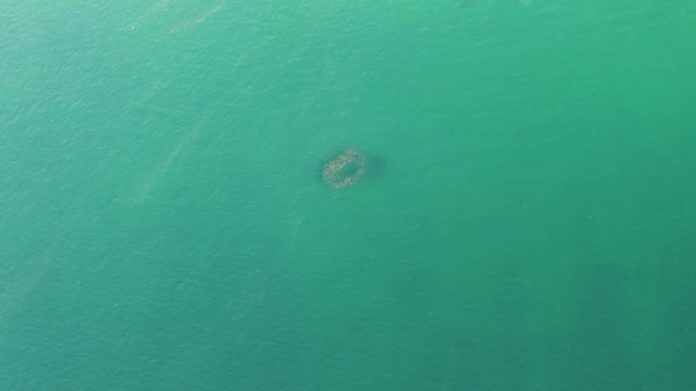 BUZZARDS BEACH EAST CAPE BCS-2023: Small Submerged Structure in Clear Ocean Water