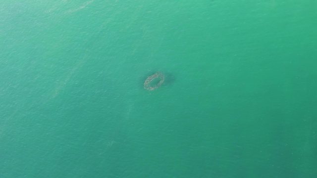 BUZZARDS BEACH EAST CAPE BCS-2023: Circular Structure in Calm Ocean Waters