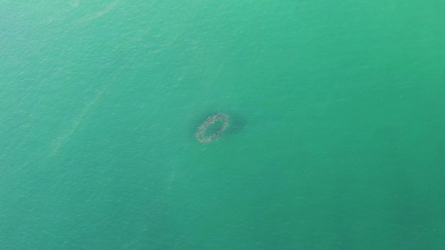 BUZZARDS BEACH EAST CAPE BCS-2023: Circular Underwater Structure in Turquoise Water