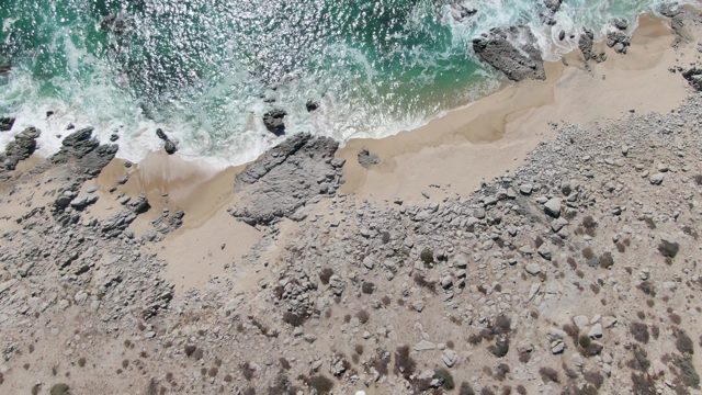 BUZZARDS BEACH EAST CAPE BCS-2023: Waves Crashing on Rocky Sandy Shore
