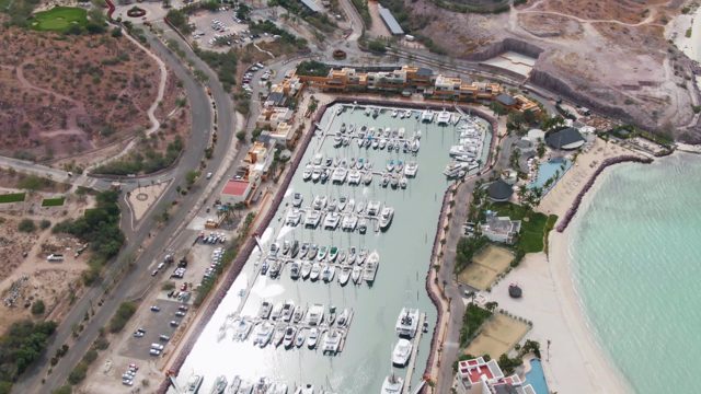 LA PAZ BCS-2023: Coastal Marina with Yachts and Winding Road