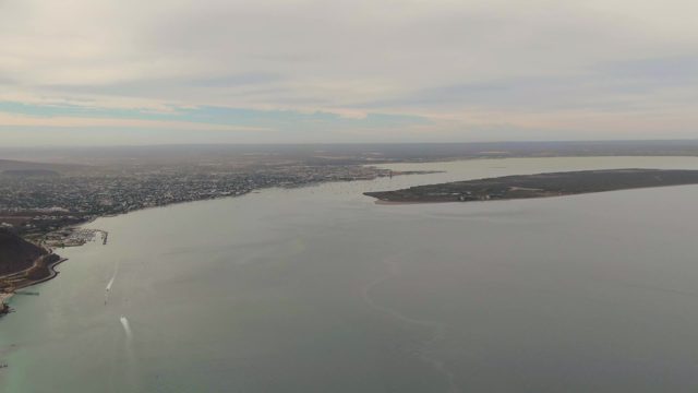 LA PAZ BCS-2023: Coastal Cityscape and Waterway with Boat Trail