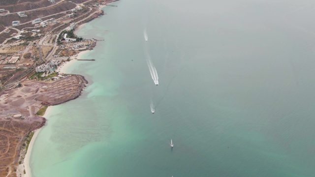 LA PAZ BCS-2023: Boats Moving in Turquoise Coastal Waters