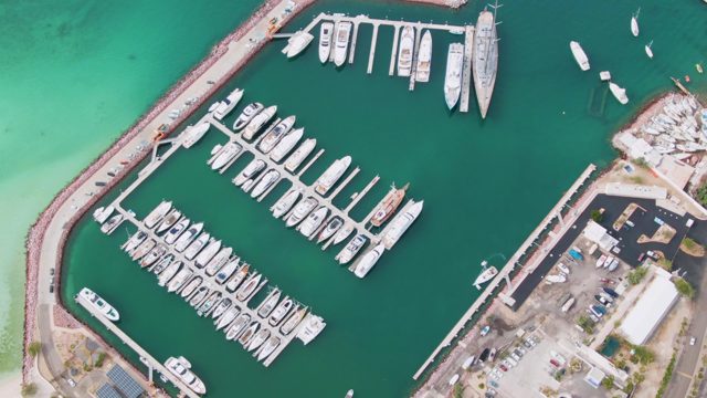 LA PAZ BCS-2023: Marina with Docked Boats and Departing Boat