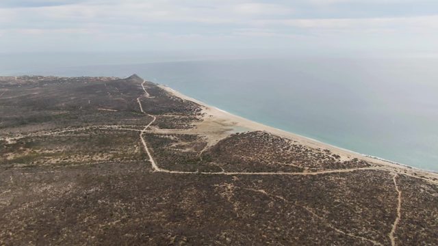 PUNTA GORDA BEACH BCS-2023: Coastal Shoreline with Sandy Beach and Rocky Terrain