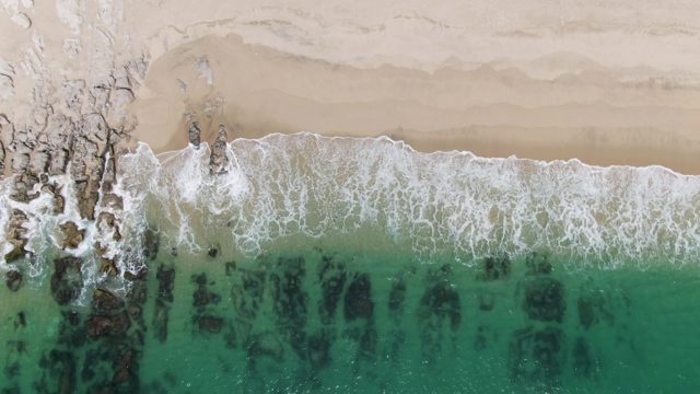 PUNTA GORDA BEACH BCS-2023: Waves Crashing on Rocky Shore From Above