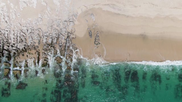PUNTA GORDA BEACH BCS-2023: Waves Crashing on Rocky Beach Shoreline