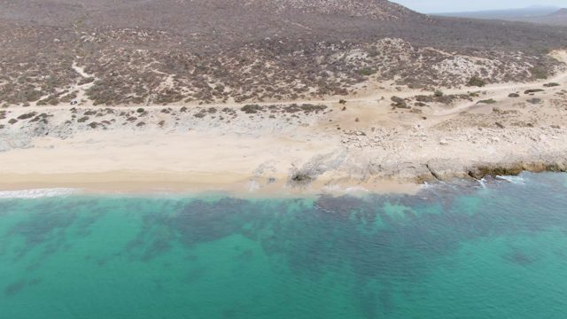 PUNTA GORDA BEACH BCS-2023: Coastal Beach with Turquoise Waters and Rocky Hills