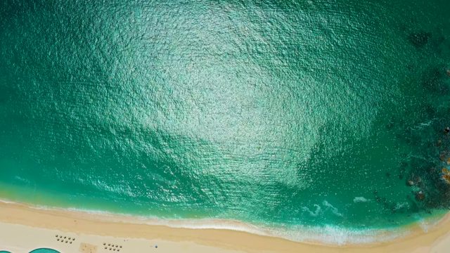 MARQUIS LOS CABOS MEXICO-2021: Gentle Ocean Waves Lapping Sandy Shore