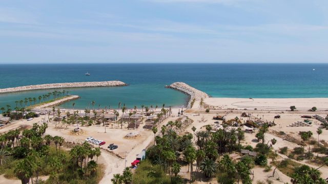 PUERTO LOS CABOS BEACH BCS-2023: Beach Road with Moving Red Vehicle