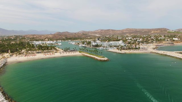 PUERTO LOS CABOS BEACH BCS-2023: Revealing Rocky Breakwater Along Sandy Coast