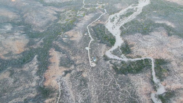 Drying Riverbed in Arid Hillscape