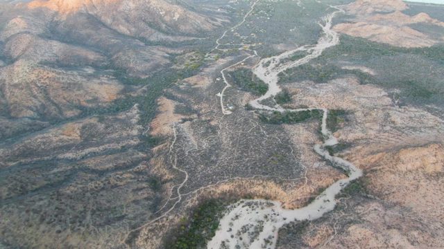 Winding Mountain Road Through Rugged Terrain