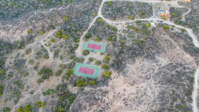 Tennis Courts on a Dry Hillside