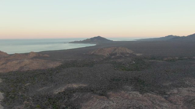 Volcanic Coastline with Road Disappearing From View