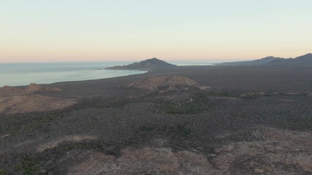 Volcanic Field and Ocean at Dusk