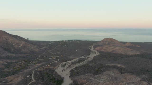 Vehicle Traveling on Winding Mountain Road